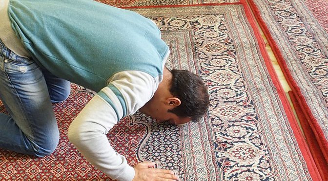 Muslim man praying